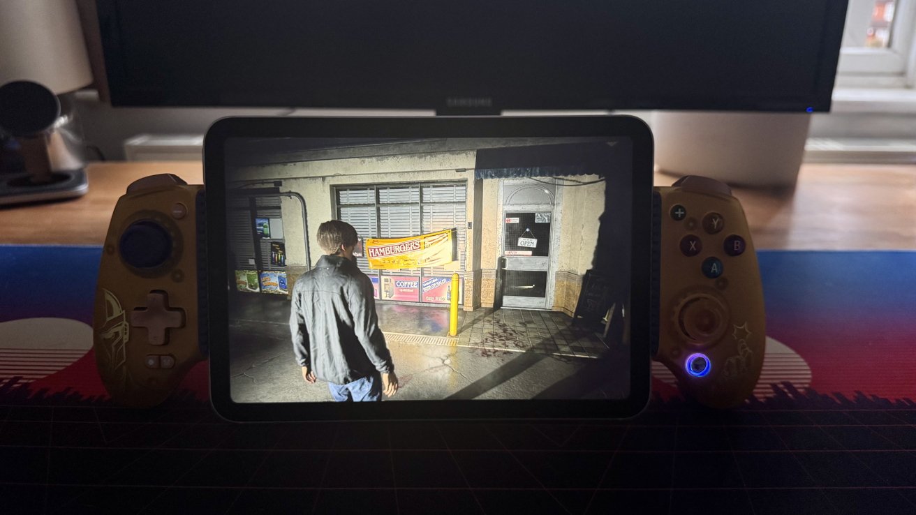 iPad mini and a Gamesir G8 controller running Resident Evil 2.
