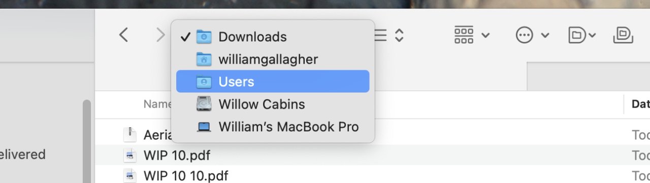 Dropdown menu on a computer showing folders and files, with 'Users' highlighted in blue and options like 'Downloads' and various document names visible.